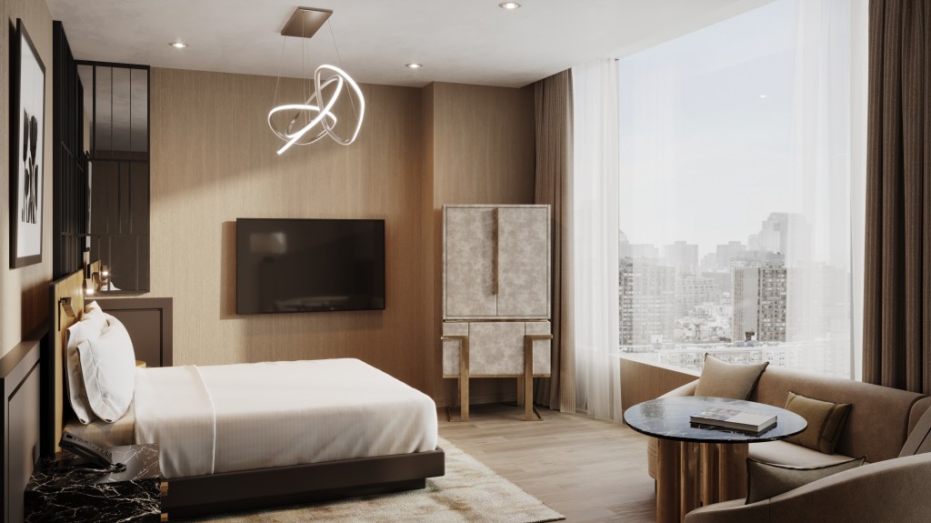 A luxurious room at the Ritz-Carlton NoMad with a comfortable bed and television